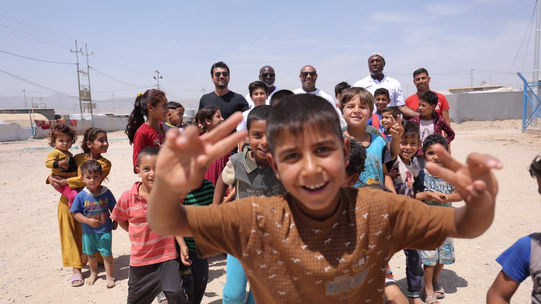 Karim with Children at School