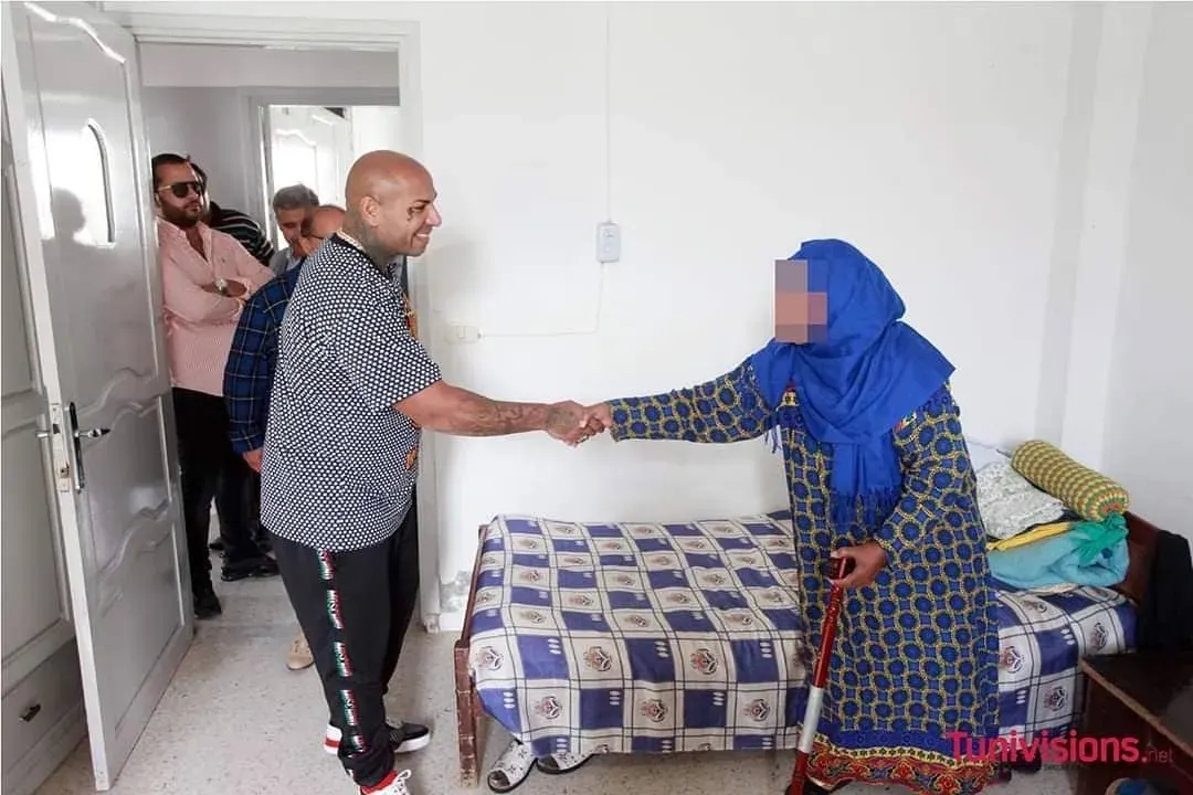 Karim Gharbi visiting elderly residents
