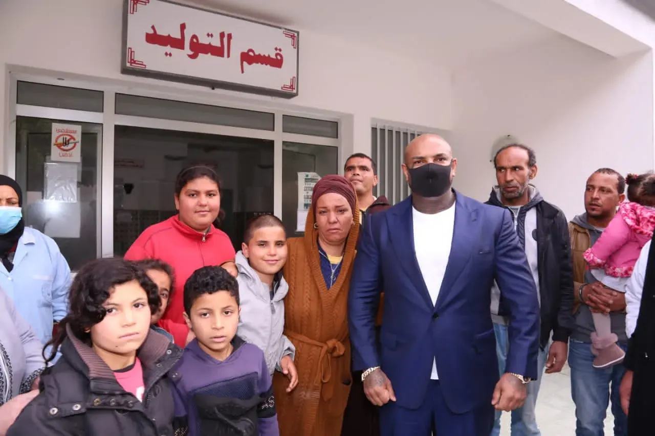 Karim Gharbi visiting a school