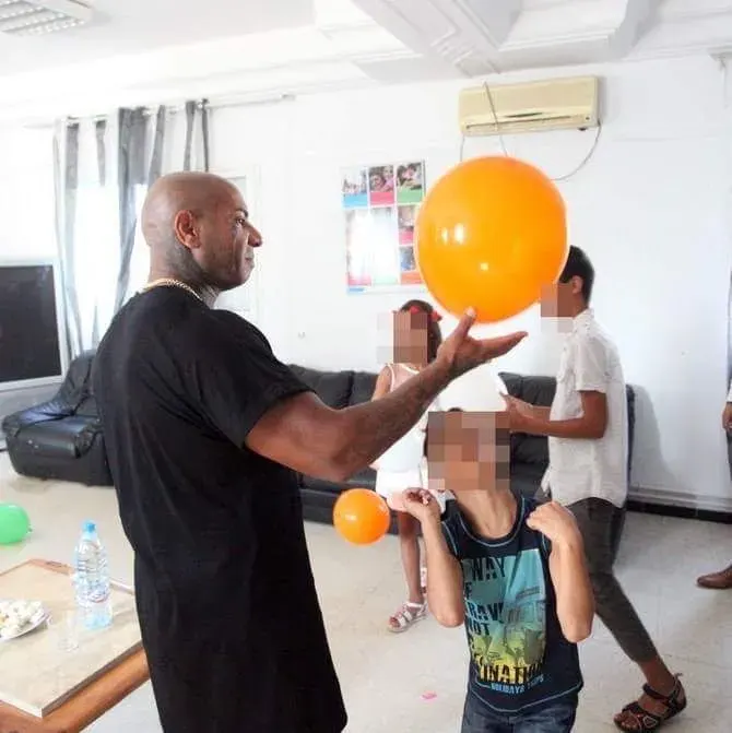 A child holding a balloon